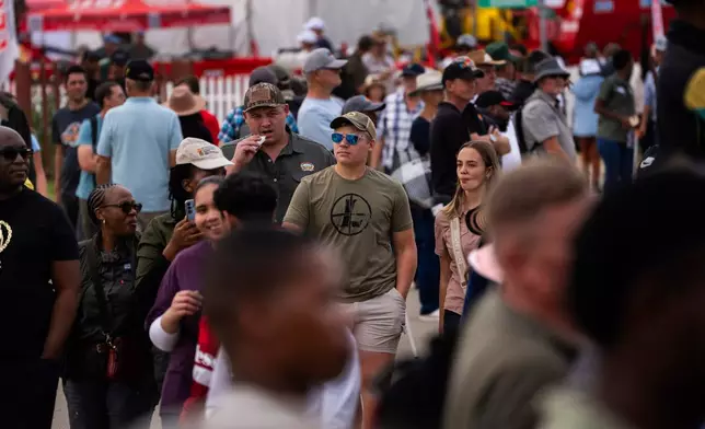 Farmers visit the Nampo agricultural fair, one of the largest in the southern hemisphere, near Bothaville, South Africa, May 15, 2025. (AP Photo/Jerome Delay)