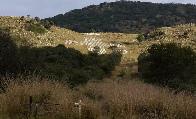 A view of crosses planted at the White Cross Monument, each one marking a white farmer who has been killed in a farm murder, is seen on a hillside in Ysterberg near Polokwane, South Africa, May 15, 2025. (AP Photo/Themba Hadebe)