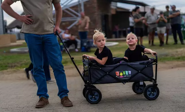 Farmers visit the Nampo agricultural fair, one of the largest in the southern hemisphere, near Bothaville, South Africa, May 15, 2025. (AP Photo/Jerome Delay)
