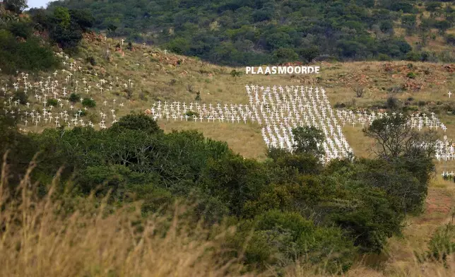 A view of crosses planted at the White Cross Monument, each one marking a white farmer who has been killed in a farm murder, is seen on a hillside in Ysterberg near Polokwane, South Africa, May 15, 2025. (AP Photo/Themba Hadebe)