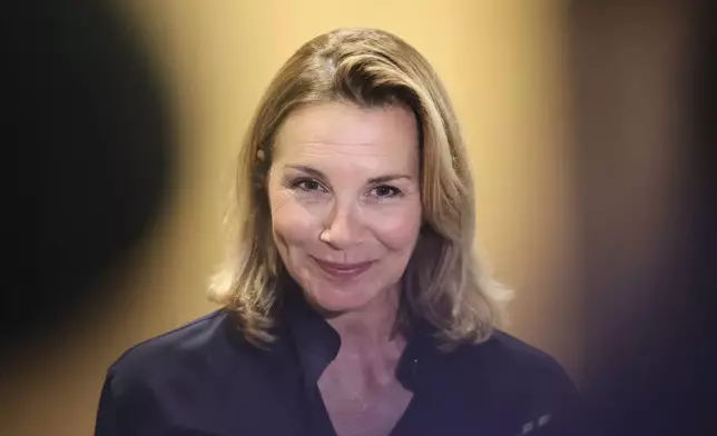 A plaintiff speaks with the media outside a Paris court, after a verdict was delivered on accusations that French actor Gerard Depardieu sexually assaulted two women who were working on a film with him in 2021, in Paris, Tuesday, May 13, 2025. (AP Photo/Thomas Padilla)