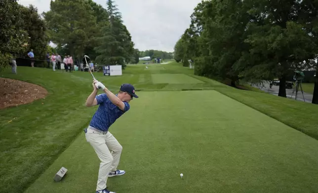 Rupe Taylor hits his tee shot on the 16th hole during a practice round for the PGA Championship golf tournament at the Quail Hollow Club, Monday, May 13, 2024, in Charlotte, N.C. (AP Photo/David J. Phillip)