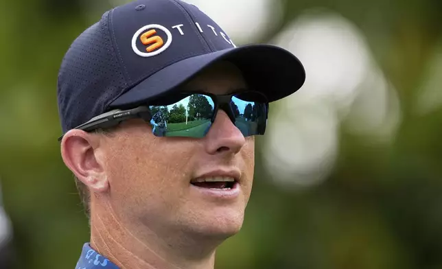Rupe Taylor watches on the 16th hole during a practice round for the PGA Championship golf tournament at the Quail Hollow Club, Monday, May 13, 2024, in Charlotte, N.C. (AP Photo/David J. Phillip)