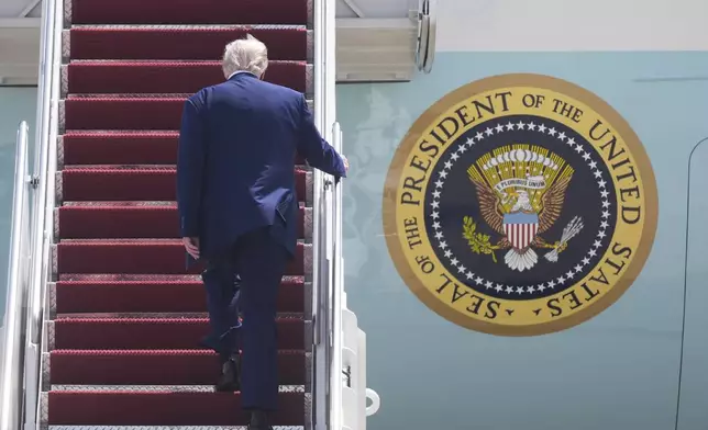 President Donald Trump boards Air Force One at Joint Base Andrews, Md., on his way to Riyadh, Saudi Arabia, Monday, May 12, 2025. (AP Photo/Manuel Balce Ceneta)