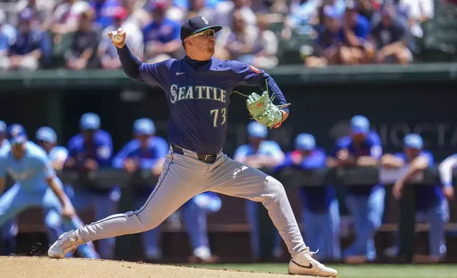 Seattle Mariners starting pitcher Logan Evans throws a pitch to the Texas Rangers during the first inning of a baseball game Sunday, May 4, 2025, in Arlington, Texas. (AP Photo/Julio Cortez)