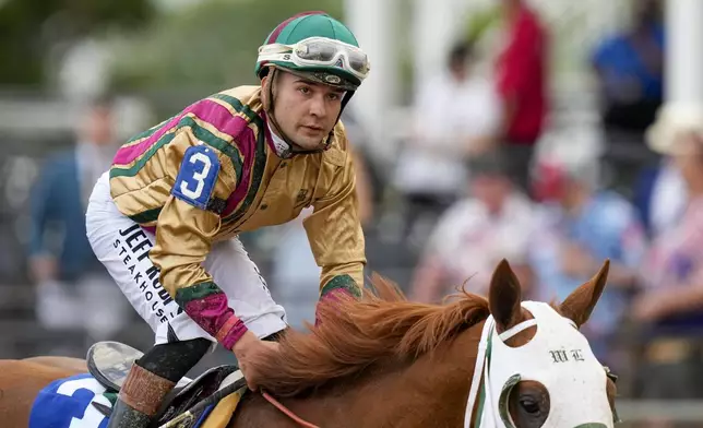 Nik Juarez, atop American Promise, looks on after participating in the 150th running of the Preakness Stakes horse race Saturday, May 17, 2025, at Pimlico Race Course in Baltimore. (AP Photo/Stephanie Scarbrough)