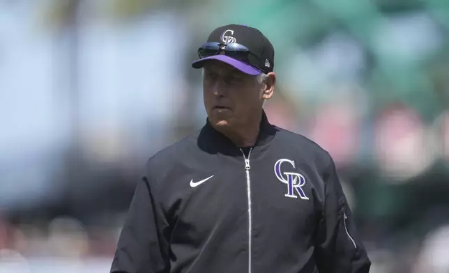 Colorado Rockies manager Bud Black walks to the dugout after making a pitching change during the seventh inning of a baseball game against the San Francisco Giants in San Francisco, Saturday, May 3, 2025. (AP Photo/Jeff Chiu)