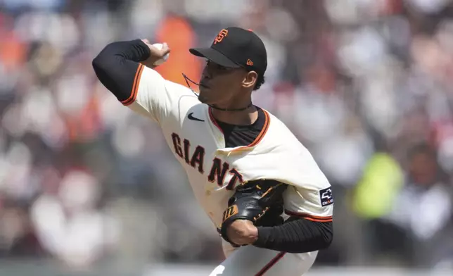 San Francisco Giants pitcher Randy Rodríguez throws against the Colorado Rockies during the sixth inning of a baseball game in San Francisco, Saturday, May 3, 2025. (AP Photo/Jeff Chiu)