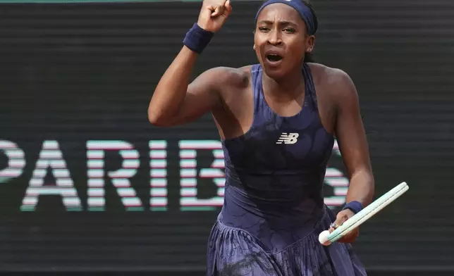 Coco Gauff of the U.S. celebrates winning against Tereza Valentova of the Czech Republic following their second round match of the French Tennis Open, at the Roland-Garros stadium, in Paris, Thursday, May 29, 2025. (AP Photo/Christophe Ena)