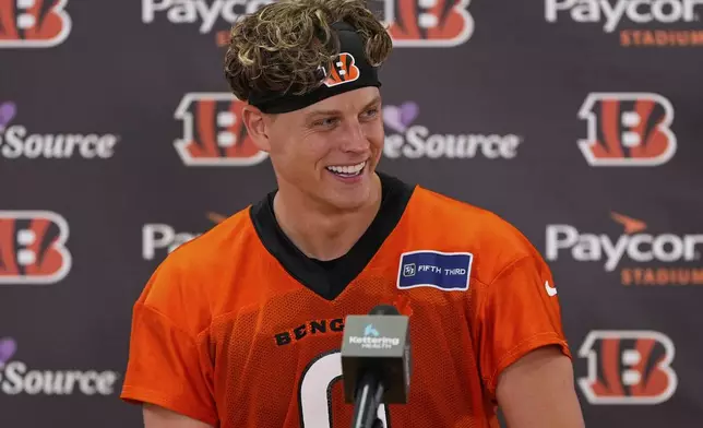 Cincinnati Bengals quarterback Joe Burrow speaks at a news conference after NFL football practice, Tuesday, May 20, 2025, in Cincinnati. (AP Photo/Carolyn Kaster)