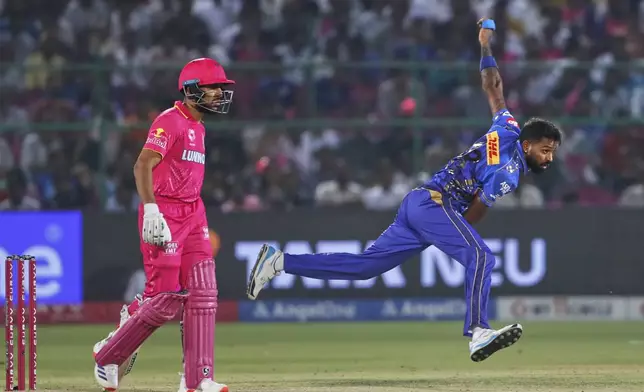 Mumbai Indians' captain Hardik Pandya bowls a delivery during the Indian Premier League cricket match between Rajasthan Royals and Mumbai Indians at Sawai Mansingh Stadium in Jaipur, India, Thursday, May 1, 2025. (AP Photo/Surjeet Yadav)