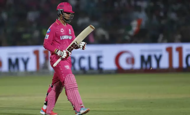 Rajasthan Royals' Vaibhav Suryavanshi walks off the field after losing his wicket during the Indian Premier League cricket match between Rajasthan Royals and Mumbai Indians at Sawai Mansingh Stadium in Jaipur, India, Thursday, May 1, 2025. (AP Photo/Surjeet Yadav)