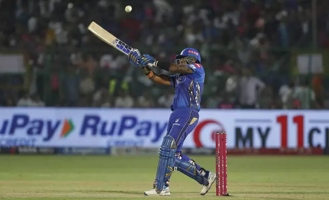 Mumbai Indians' Suryakumar Yadav plays a shot during the Indian Premier League cricket match between Rajasthan Royals and Mumbai Indians at Sawai Mansingh Stadium in Jaipur, India, Thursday, May 1, 2025. (AP Photo/Surjeet Yadav)