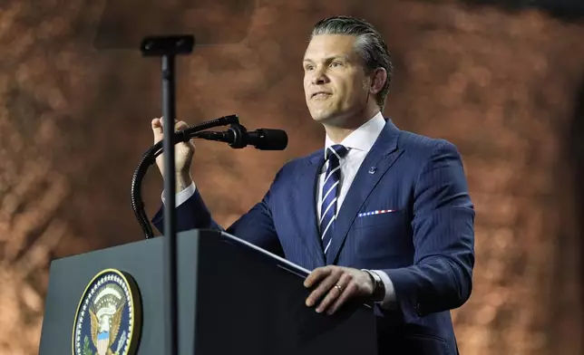 U.S. Secretary of Defense Pete Hegseth speaks at the Al Udeid Air Base, Thursday, May 15, 2025, in Doha, Qatar. (AP Photo/Alex Brandon)