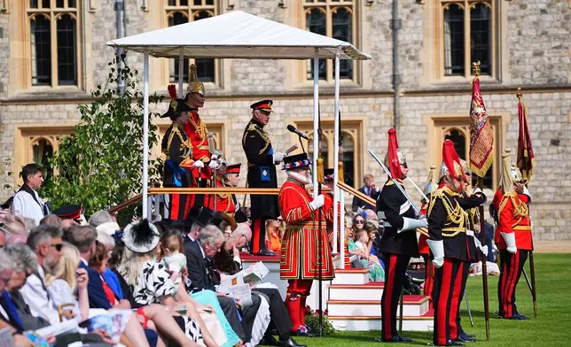 Britain's King Charles III and Princess Anne attend the presentation of the New Standards at Windsor Castle, Windsor, England, Monday May 12, 2025. (Aaron Chown/Pool via AP)
