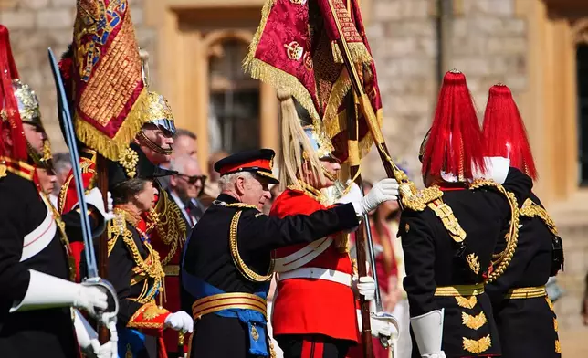 Britain's King Charles III attends the presentation of the New Standards at Windsor Castle, Windsor, England, Monday May 12, 2025. (Aaron Chown/Pool via AP)