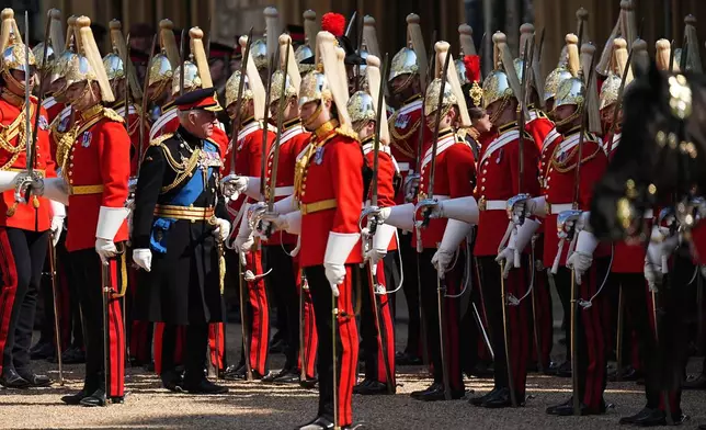 Britain's King Charles III attends the presentation of the New Standards at Windsor Castle, Windsor, England, Monday May 12, 2025. (Aaron Chown/Pool via AP)