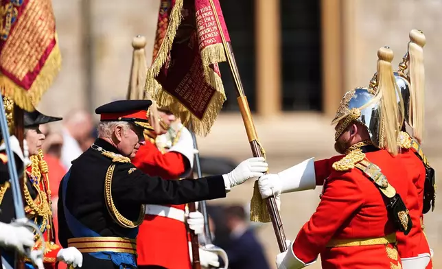 Britain's King Charles III attends the presentation of the New Standards at Windsor Castle, Windsor, England, Monday May 12, 2025. (Aaron Chown/Pool via AP)