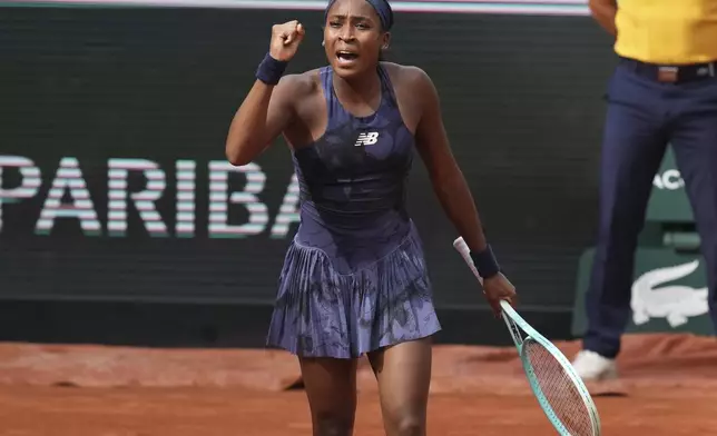 Coco Gauff of the U.S. celebrates winning against Tereza Valentova of the Czech Republic following their second round match of the French Tennis Open, at the Roland-Garros stadium, in Paris, Thursday, May 29, 2025. (AP Photo/Christophe Ena)