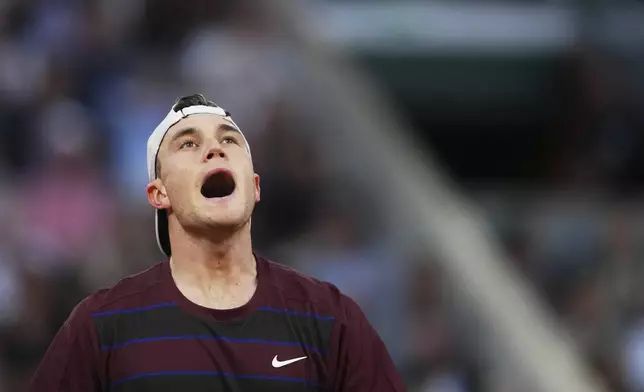 Britain's Jack Draper reacts during a second-round match against France's Gael Monfils during the French Tennis Open at the Roland-Garros stadium in Paris, Thursday, May 29, 2025. (AP Photo/Lindsey Wasson)