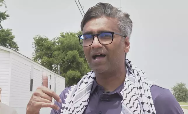 Badar Khan Suri, a Georgetown University scholar from India, speaks after he was released from immigration detention facility Wednesday, May 14, 2025, in Alvarado, Texas. (AP Photo/Kendria LaFleur)