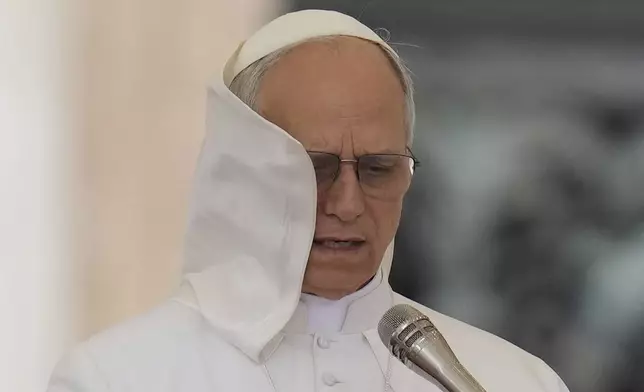 Pope Leo XIV holds his first weekly general audience in St. Peter's Square at The Vatican, Wednesday, May 21, 2025. (AP Photo/Gregorio Borgia)
