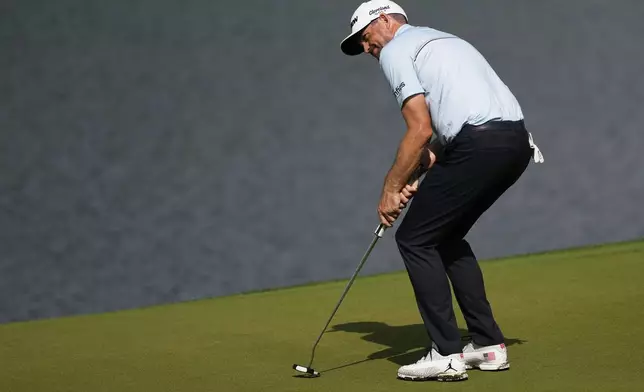 Keegan Bradley reacts after missing a putt on the 14th hole during the first round of the PGA Championship golf tournament at the Quail Hollow Club, Thursday, May 15, 2025, in Charlotte, N.C. (AP Photo/Matt York)