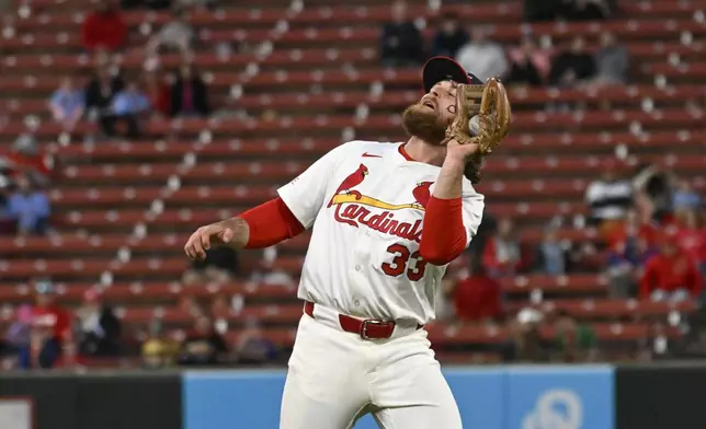 St. Louis Cardinals second baseman Brendan Donovan catches a popup by New York Mets' Tyrone Taylor in the eighth inning during the second baseball game of a doubleheader, Sunday, May 4, 2025, in St. Louis. (AP Photo/Joe Puetz)