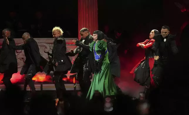Lady Gaga, center, performs during her free concert on Copacabana Beach in Rio de Janeiro, Saturday, May 3, 2025. (AP Photo/Silvia Izquierdo)