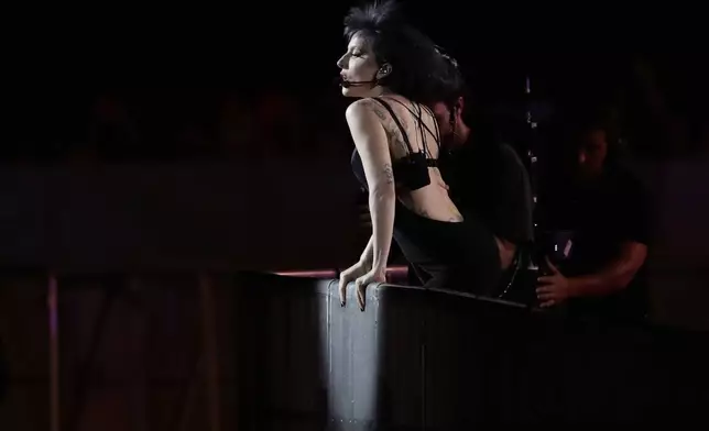 Lady Gaga takes part in a rehearsal a day ahead of her free concert, on Copacabana beach, in Rio de Janeiro, Friday, May 2, 2025. (AP Photo/Bruna Prado)