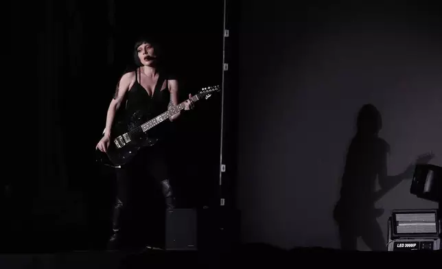 Lady Gaga takes part in a rehearsal a day ahead of her free concert, on Copacabana beach, in Rio de Janeiro, Friday, May 2, 2025. (AP Photo/Bruna Prado)