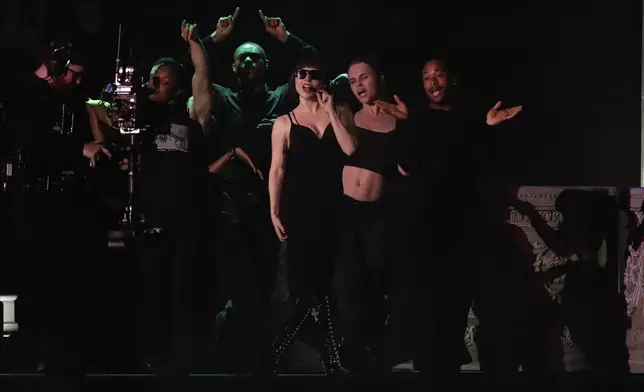 Lady Gaga takes part in a rehearsal a day ahead of her free concert, on Copacabana beach, in Rio de Janeiro, Friday, May 2, 2025. (AP Photo/Bruna Prado)