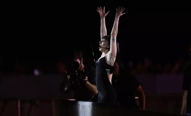 Lady Gaga takes part in a rehearsal a day ahead of her free concert, on Copacabana beach, in Rio de Janeiro, Friday, May 2, 2025. (AP Photo/Bruna Prado)