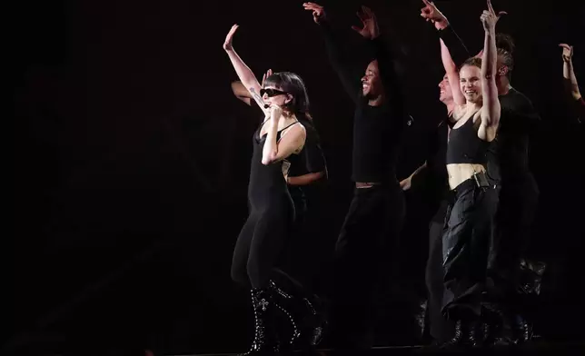 Lady Gaga takes part in a rehearsal a day ahead of her free concert, on Copacabana beach, in Rio de Janeiro, Friday, May 2, 2025. (AP Photo/Bruna Prado)
