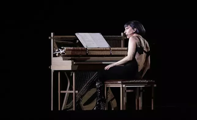 Lady Gaga takes part in a rehearsal a day ahead of her free concert, on Copacabana beach, in Rio de Janeiro, Friday, May 2, 2025. (AP Photo/Bruna Prado)