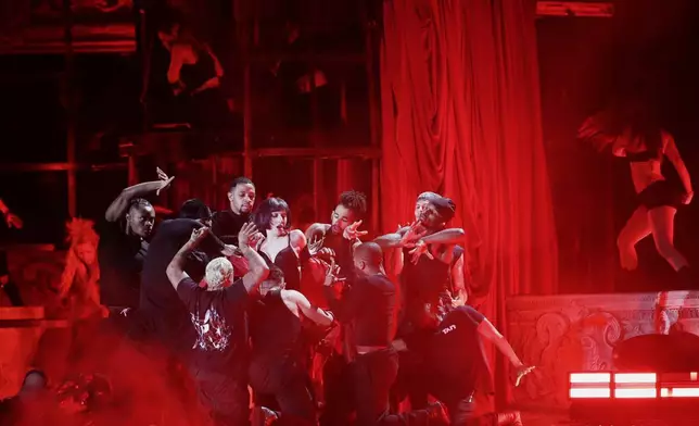 Lady Gaga takes part in a rehearsal a day ahead of her free concert, on Copacabana beach, in Rio de Janeiro, Friday, May 2, 2025. (AP Photo/Bruna Prado)