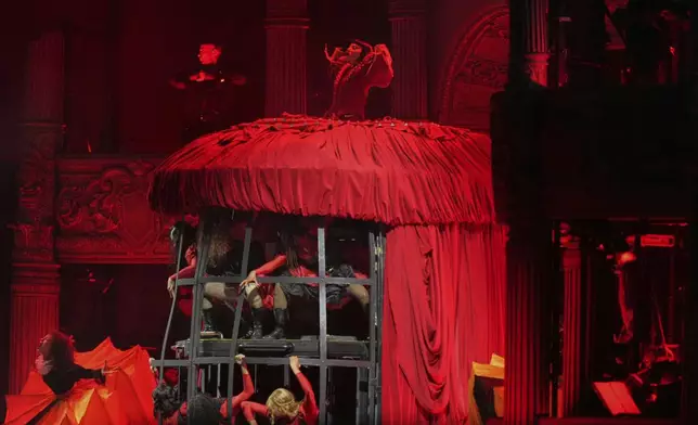 Lady Gaga, top center, performs during her free concert on Copacabana Beach in Rio de Janeiro, Saturday, May 3, 2025. (AP Photo/Silvia Izquierdo)