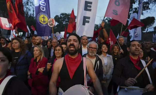 Several thousand Turkish Cypriots took to the streets of the northern half of ethnically divided Cyprus' capital Nicosia to protest what they say is Turkey's attempt to erode their secular roots and to strengthen the hold of political Islam over their society, on Friday, May 2, 2025. (AP Photo/Petros Karadjias)