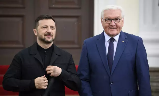 German President Frank-Walter Steinmeier, right, welcomes Ukrainian President Volodymyr Zelenskyy, left, for a meeting in Berlin, Germany, Wednesday, May 28, 2025. (Bernd von Jutrczenka/dpa via AP)