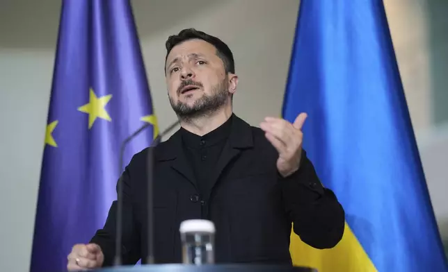 Ukraine's President Volodymyr Zelenskyy gestures during a news conference at the chancellery in Berlin, Germany, Wednesday, May 28, 2025.(AP Photo/Markus Schreiber)