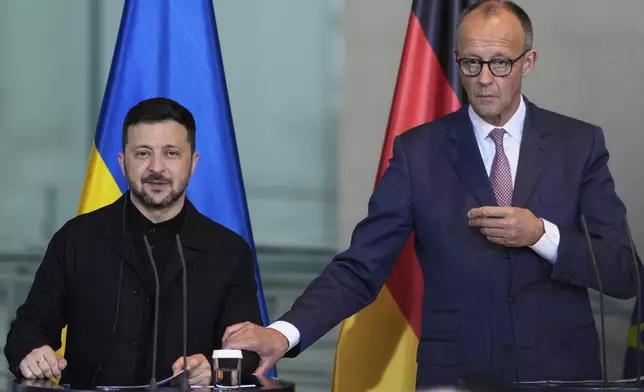 Germany's Chancellor Friedrich Merz, right, and Ukraine's President Volodymyr Zelenskyy attend a news conference at the chancellery in Berlin, Germany, Wednesday, May 28, 2025.(AP Photo/Markus Schreiber)