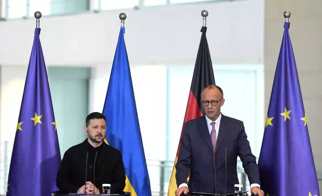 Germany's Chancellor Friedrich Merz, right, and Ukraine's President Volodymyr Zelenskyy attend a news conference at the chancellery in Berlin, Germany, Wednesday, May 28, 2025.(AP Photo/Markus Schreiber)