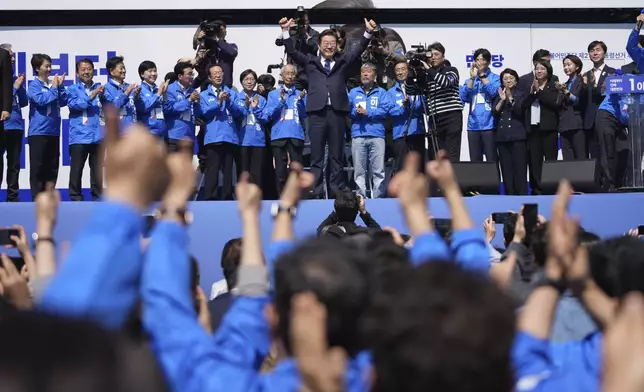 Lee Jae-myung, presidential candidate of the Democratic Party reacts while campaigning in Seoul, South Korea, Monday, May 12, 2025. (AP Photo/Lee Jin-man)