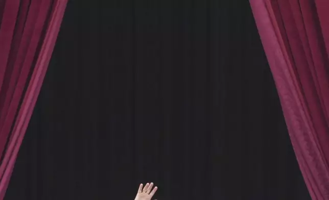 Pope Leo XIV appears at the central balcony of St. Peter's Basilica for his first Sunday blessing after his election, in St. Peter's Square at the Vatican, Sunday, May 11, 2025.(AP Photo/Andrew Medichini)