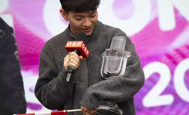 JJ from Austria talks to the media at a press conference in Vienna, Austria, on Sunday, May 18, 2025. (AP Photo/Denes Erdos)