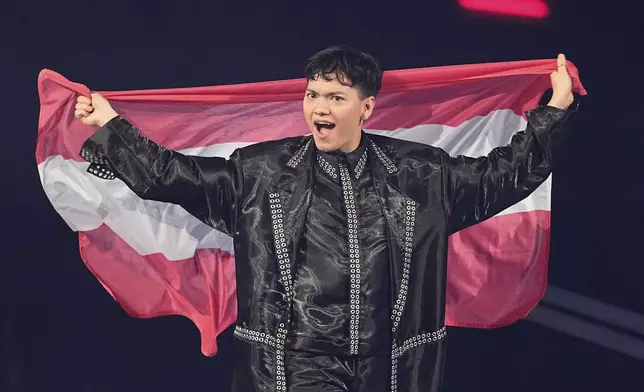 JJ from Austria reacts as he arrives on stage for the Grand Final of the 69th Eurovision Song Contest, in Basel, Switzerland, Saturday, May 17, 2025. (AP Photo/Martin Meissner)