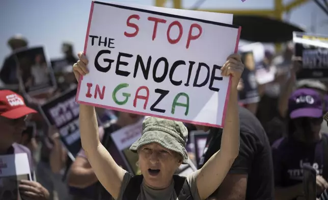 People take part in a protest demanding the end of the war in the Gaza Strip in an area near the Israeli-Gaza border in Sderot, southern Israel, Friday, May 23, 2025. (AP Photo/Leo Correa)