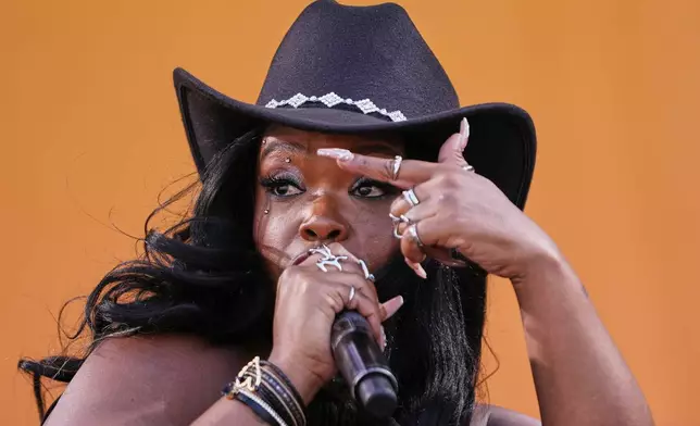 Anjelika "Jelly" Joseph performs with her band Galactic at the New Orleans Jazz &amp; Heritage Festival in New Orleans, Sunday, May 4, 2025. (AP Photo/Gerald Herbert)