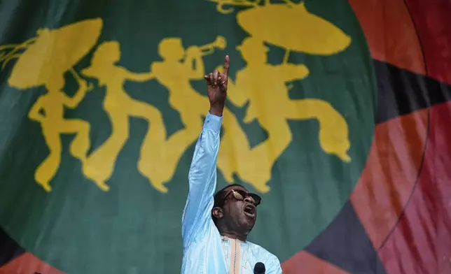 Youssou N'Dour performs at the New Orleans Jazz &amp; Heritage Festival in New Orleans, Friday, April 25, 2025. (AP Photo/Gerald Herbert)