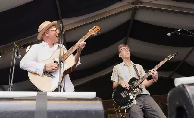 The Iguanas perform at the New Orleans Jazz &amp; Heritage Festival in New Orleans, Friday, April 25, 2025. (AP Photo/Gerald Herbert)